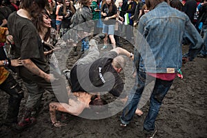 Madness in the mud at the RyÃâºka festival in ChorzÃÂ³w. Poland